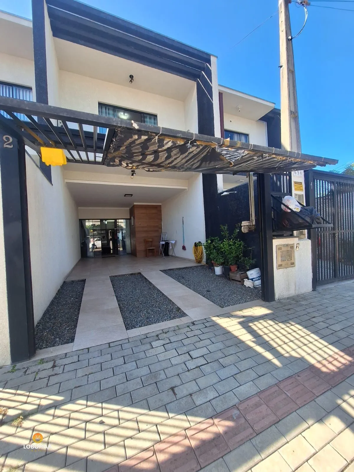 Sobrado de 3 dormitórios 124m a 680 metros da praia, no bairro Itacolomi, em Ba - foto 1