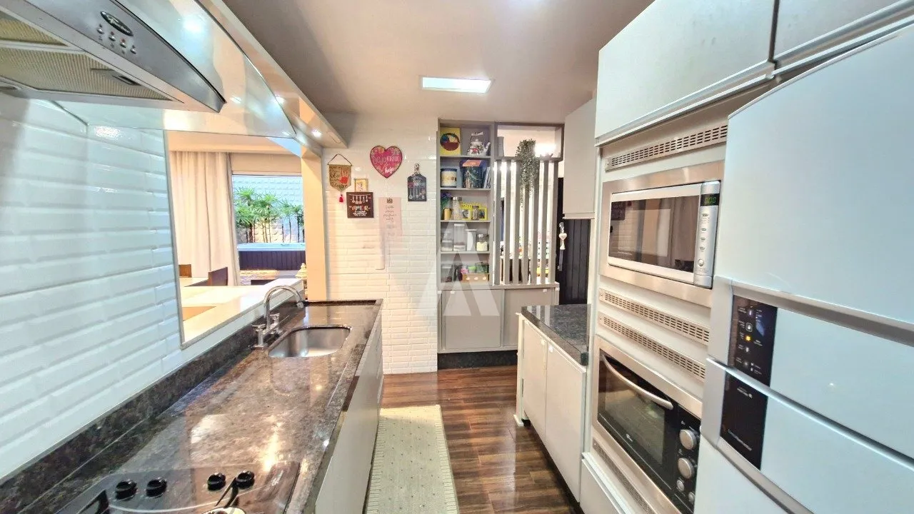 Casa em condomínio com 1 suíte e 2 quartos à venda no bairro Glória em Joinville-SC por R$940.000,00. — foto 7