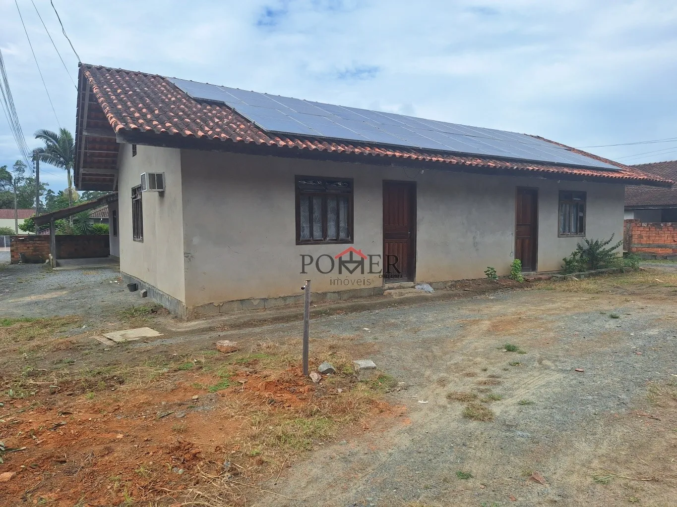 Imóvel com 4 casas rendendo aluguel, com painéis solares, em Testo Central, em via asfaltada, próximo do distrito industrial, e rodovia que liga Pomerode à Blumenau, com aprox. 223,50 de construção num terreno com 625,00m. — foto 5