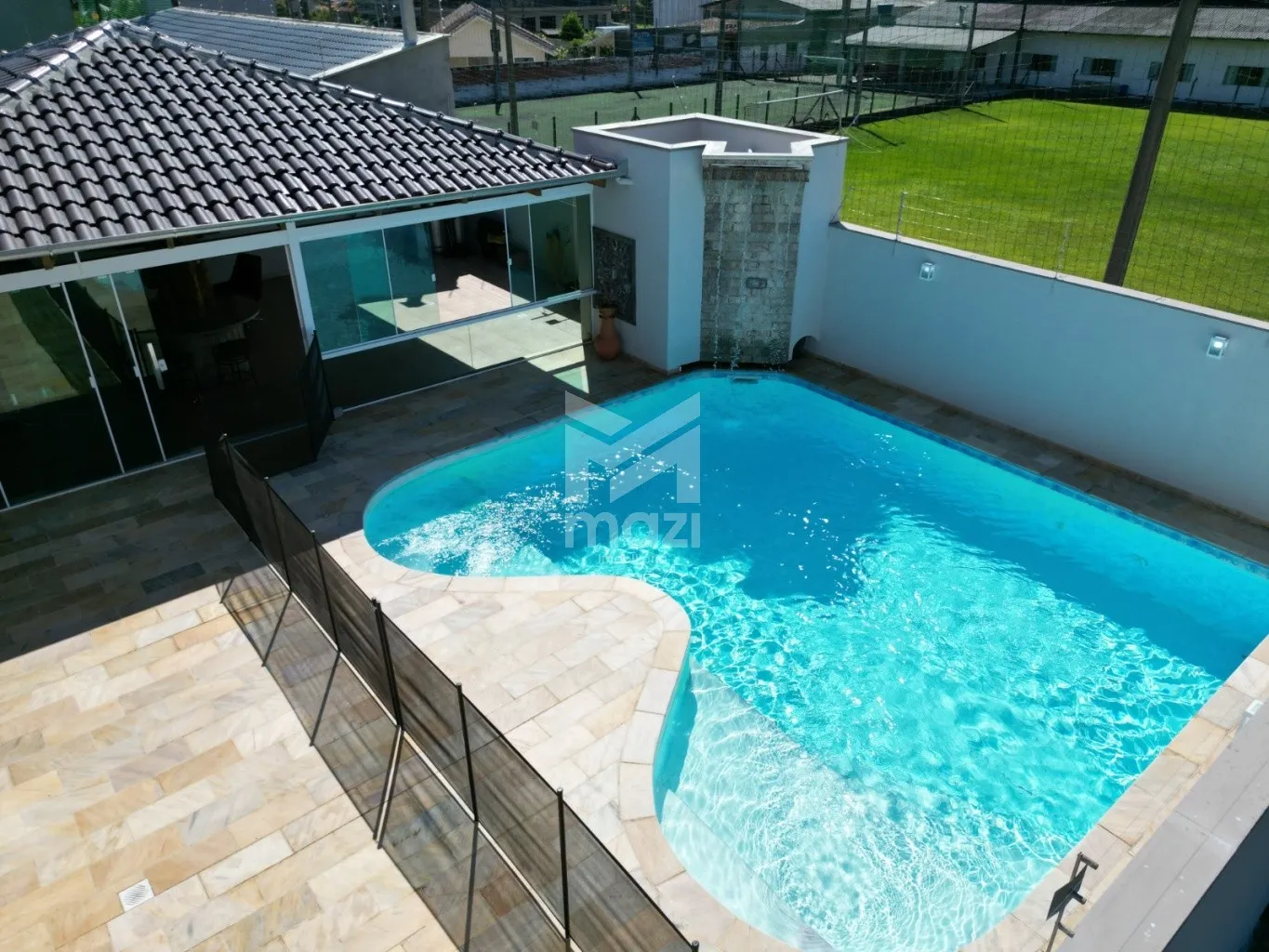 Casa de Alto Padrão com Área de Lazer Completa e Acabamentos Sofisticados — foto 5