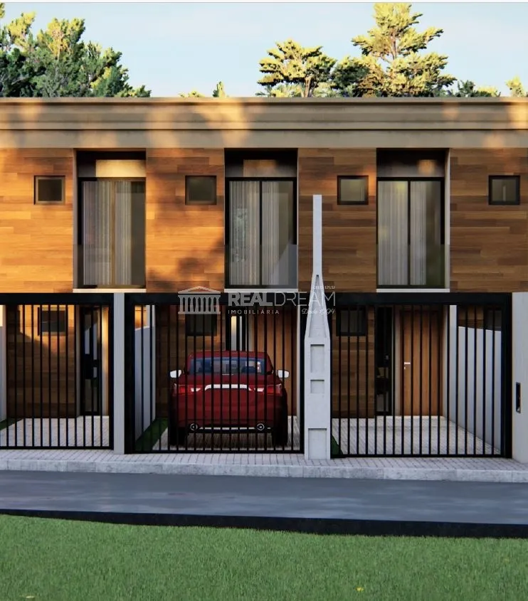 Sobrado com 2 suítes, 2 vagas de garagem e amplo quintal. — foto 2