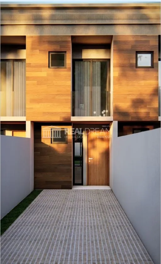 Sobrado com 2 suítes, 2 vagas de garagem e amplo quintal. — foto 4