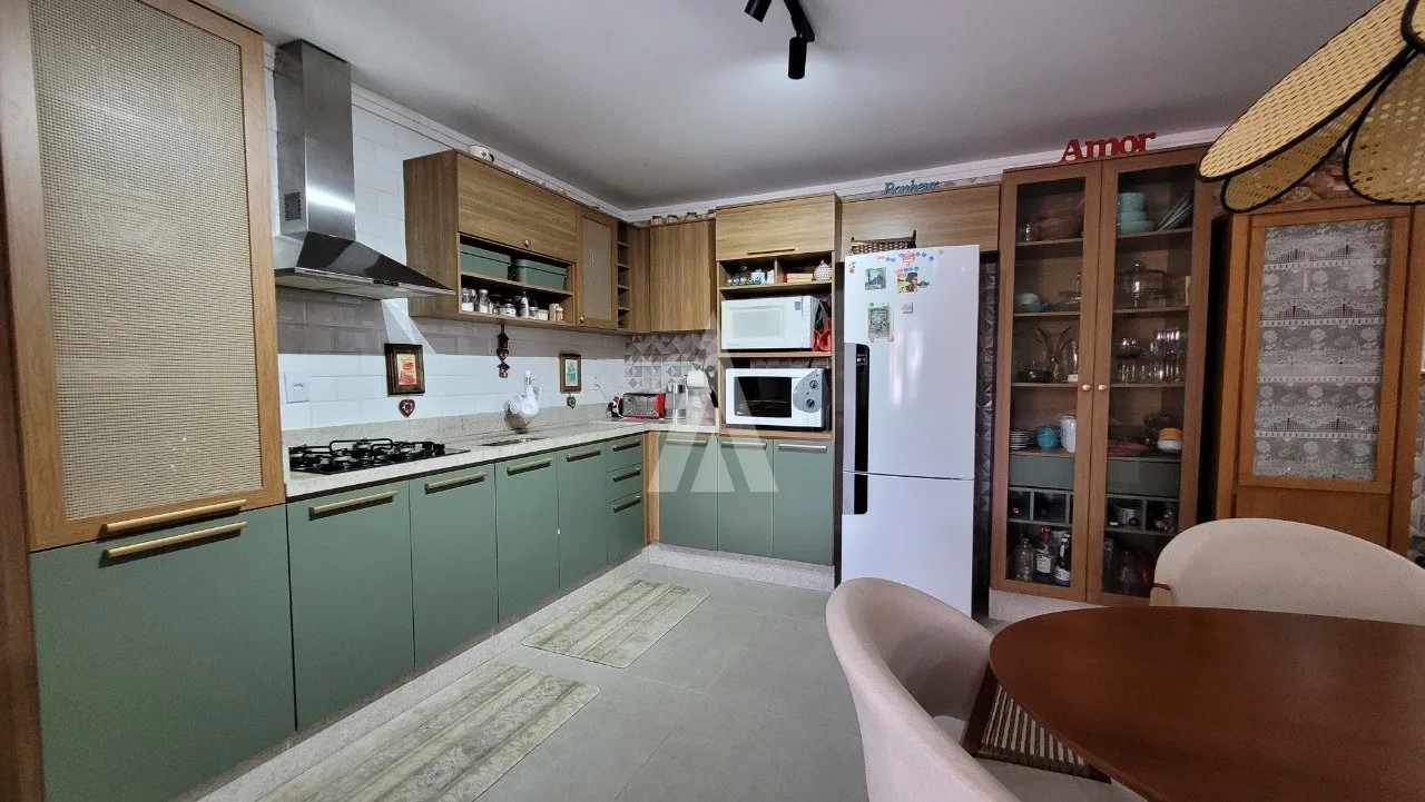 Sobrado com 2 suítes e 2 quartos à venda no bairro Costa e Silva em Joinville-SC por R$999.000,00. — foto 7