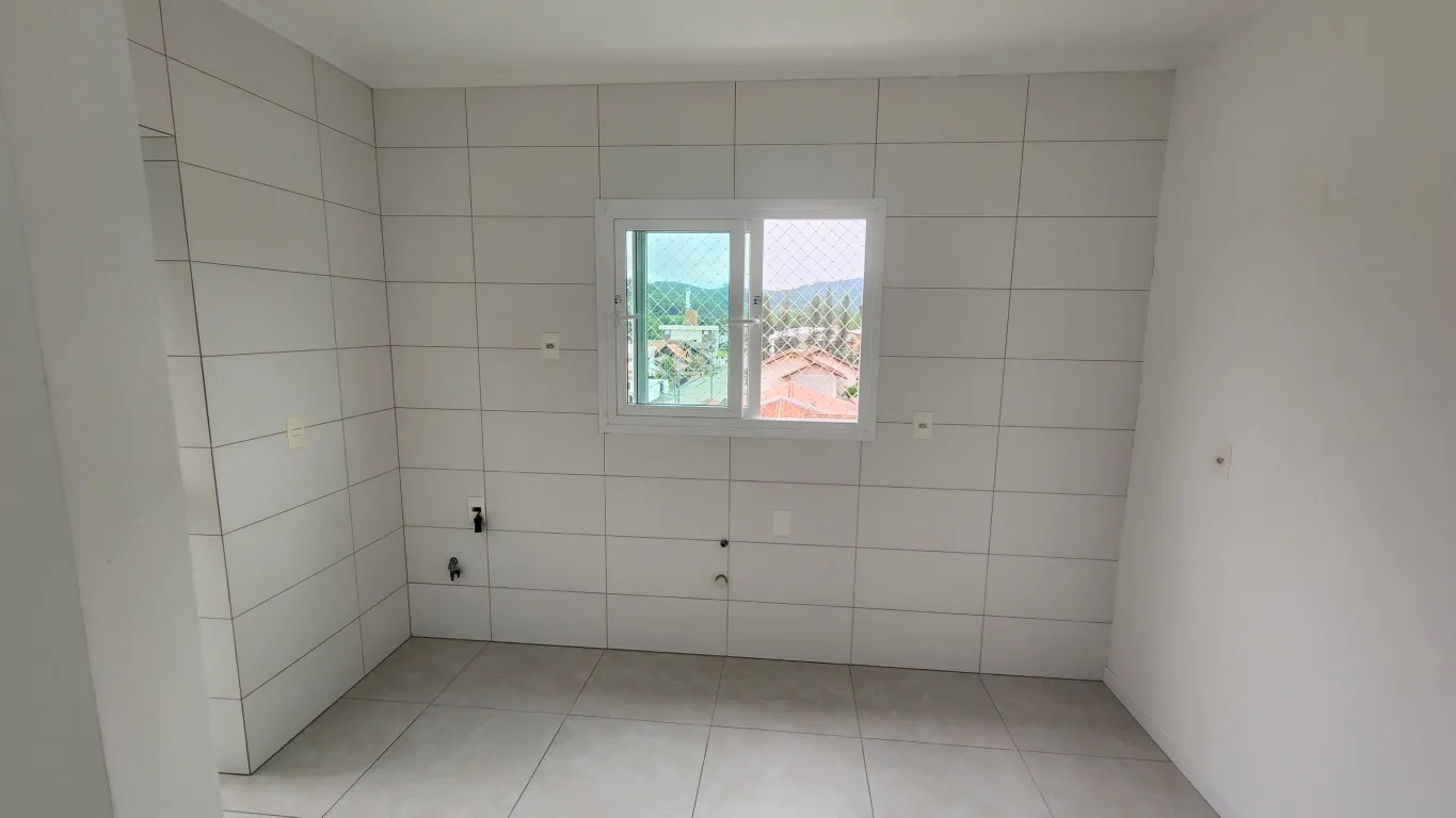 Apartamento com 2 dormitórios grandes, sendo 1 suíte, sala e cozinha conjugadas — foto 6