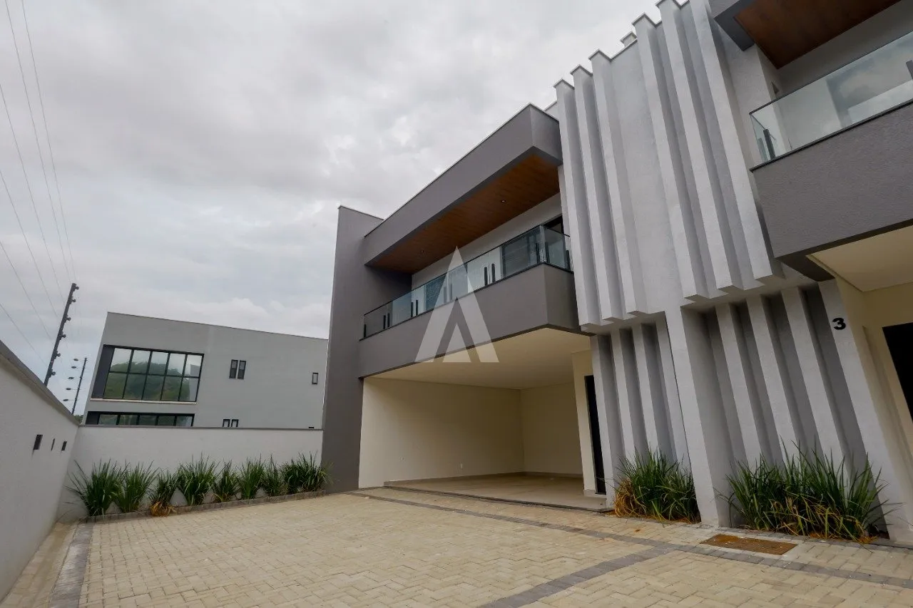 Casa em condomínio com 3 suítes à venda no bairro Glória, em Joinville, por R$ 1.540.000,00. - foto 1