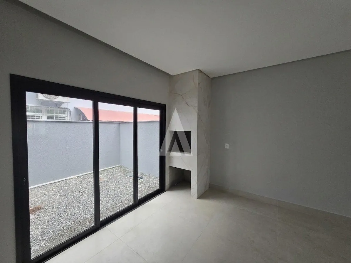 Sobrado geminado com 1 suíte e 2 quartos à venda no bairro Glória em Joinville-SC por R$769.000,00. — foto 3