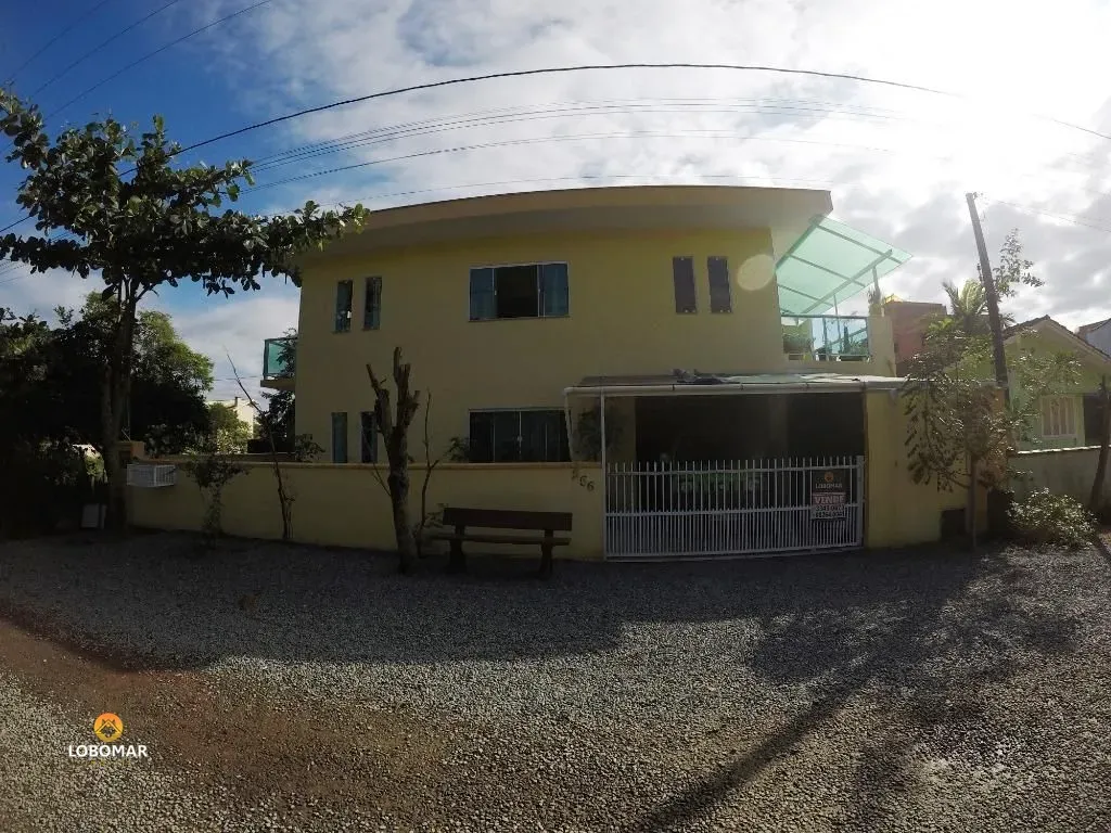 Casa com 3 dormitórios à 200m do mar, à venda, 130 m por R$ 790.000 - Itacolom — foto 2