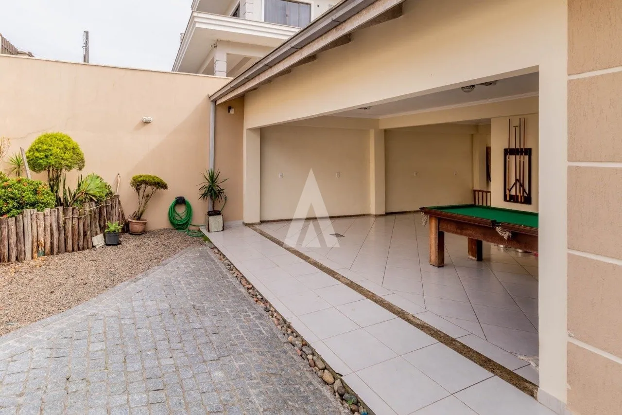 Sobrado com 1 suíte(s) mais 3 quarto(s) à venda no bairro Costa E Silva em Joinville, por R$ 1.225.000.00. — foto 4