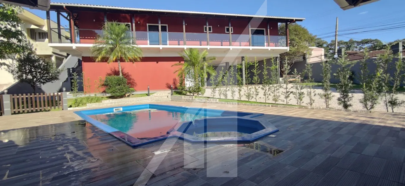 More numa residência prática e aconchegante! Muito bem construída no bairro Bela Vista, área de festas com churrasqueira e piscina adulto e infantil, são 3 dormitórios sendo 3 suítes. — foto 5
